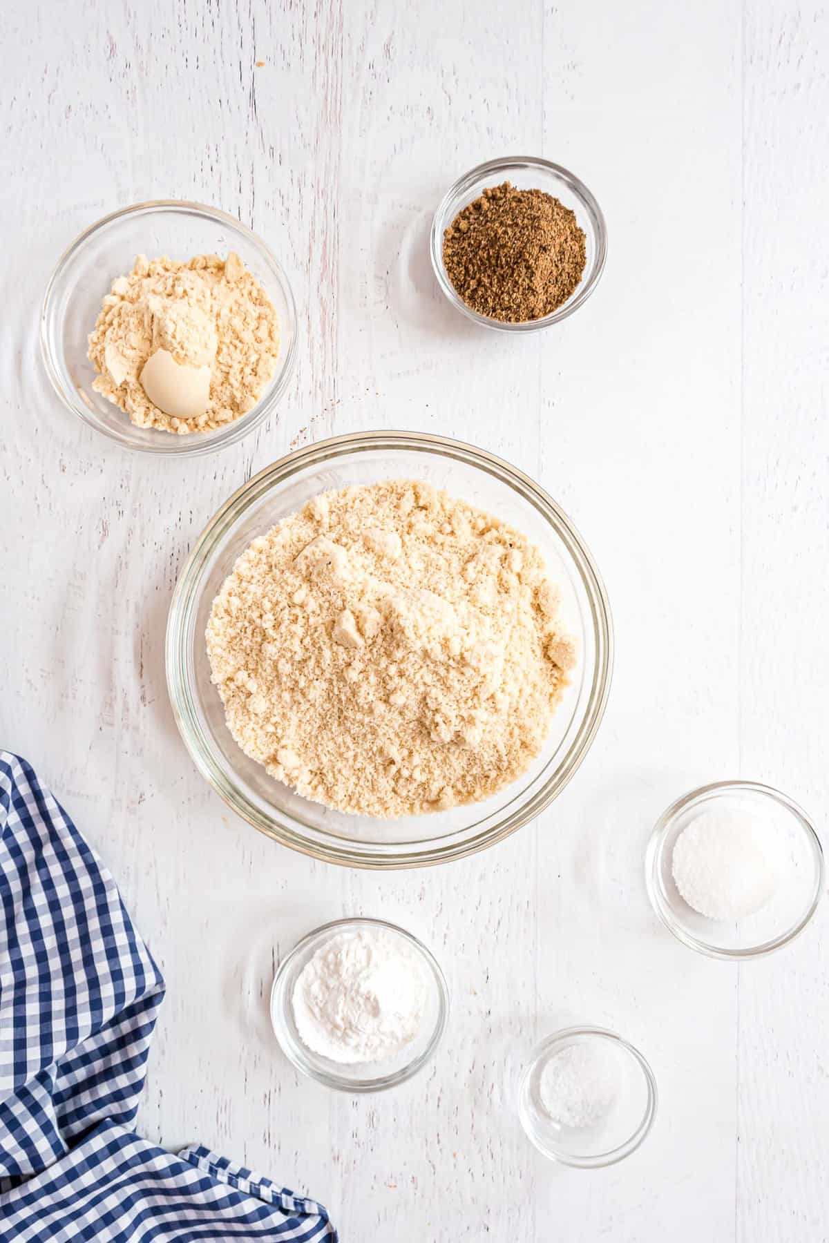 Overhead view of ingredients needed in small separate bowls.